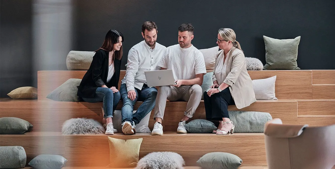 STREIT colleagues working together in their office